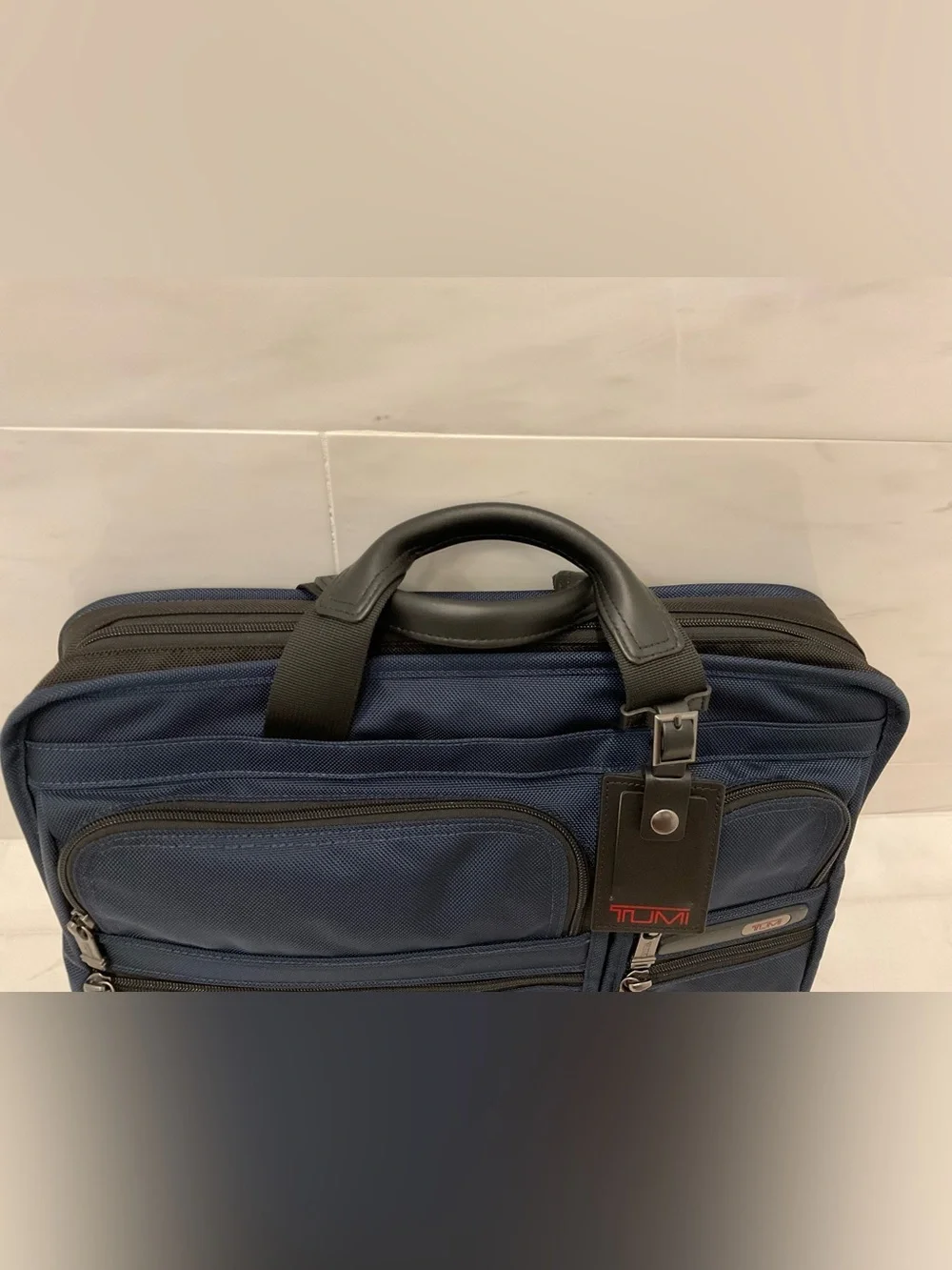 Tumi up sale